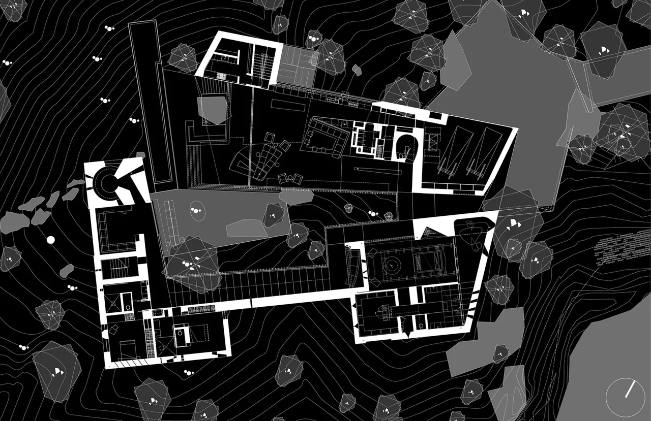 Architectural site plan of the Desert Courtyard House with surrounding landscape features and structural partitions.