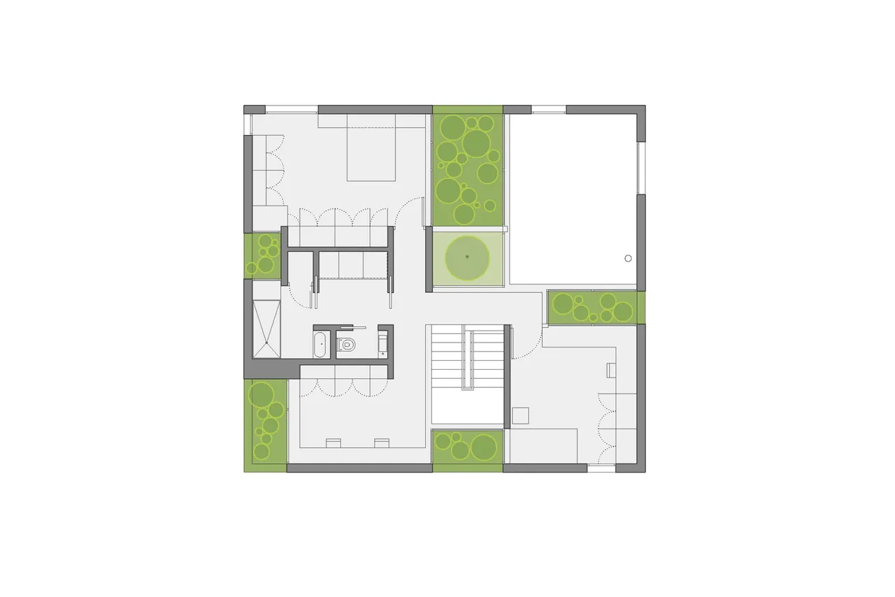 Floor plan of 'Grow Box' project with interior courtyard and multiple rooms connected by hallways and stairs.
