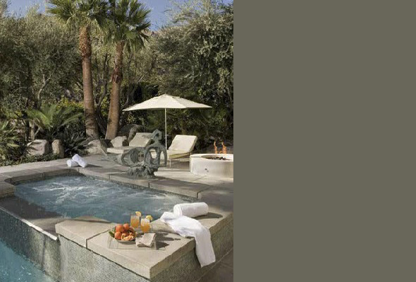 The Crescent project features a serene outdoor living space with a hot tub, fire pit, and shaded lounge area.