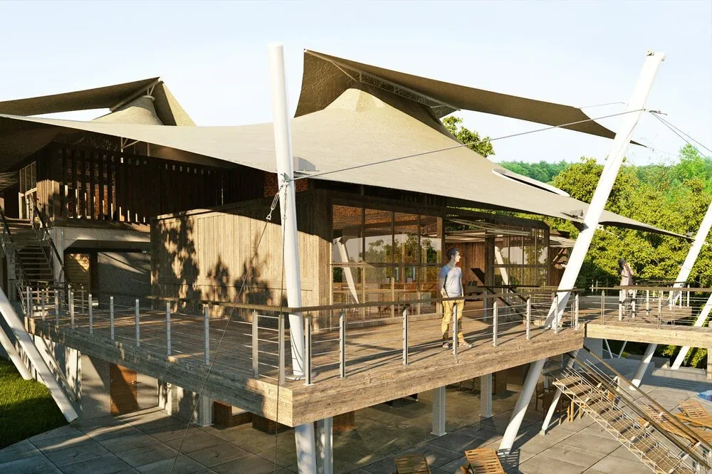 SAIL HOUSE features large tensioned shade sails over a wooden deck and glass walls, blending indoor and outdoor spaces.