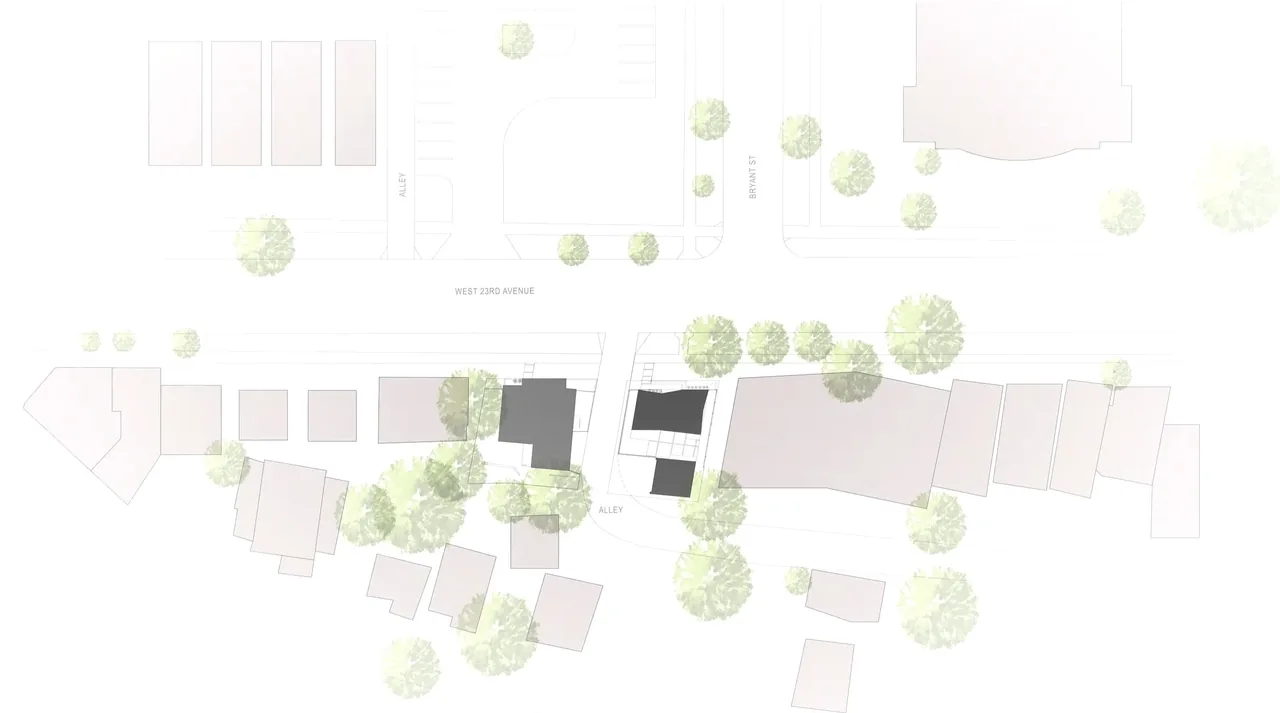 Site plan view highlights two darkly shaded buildings on a block with surrounding structures and trees along West 23rd Avenue.