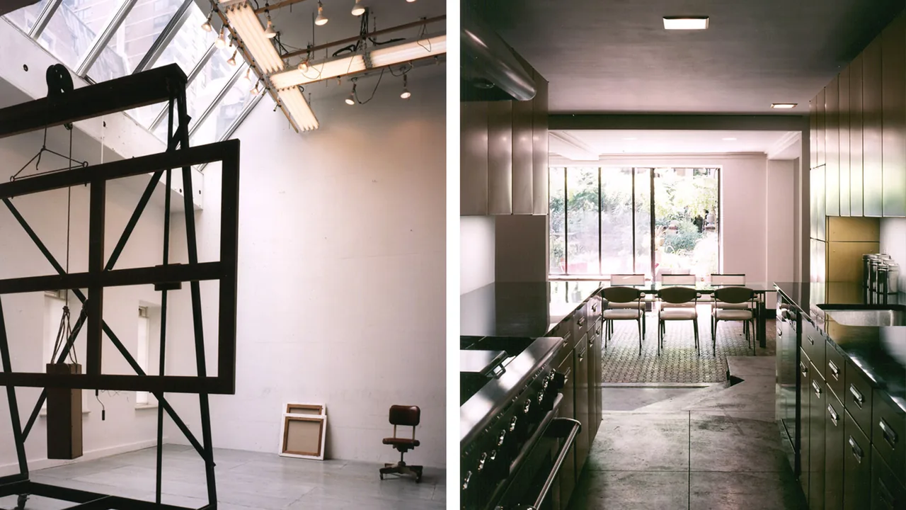 Artist's Townhouse features a spacious art studio with skylights and a sleek kitchen with garden views.