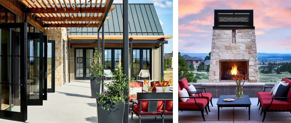 Contemporary farmhouse outdoor patio with stone fireplace and pergola, featuring black framed pivot doors and red cushioned seating.